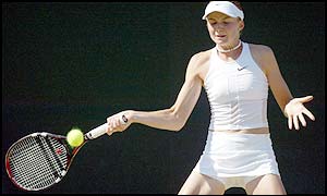 Daniela Hantuchova play a groundstroke in practice before her game against Maja Matevzic