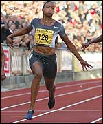 Marion Jones crosses the line in Oslo