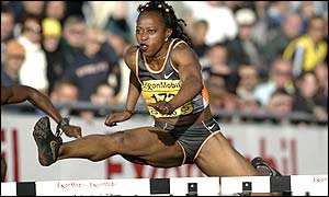 Gail Devers wins the 100m hurdles in a time just outside the best this year, which she set last week in California