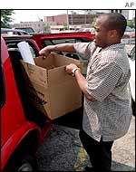 WorldCom employee leaves Iowa office after being laid off