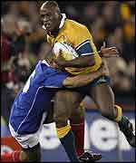 Wendell Sailor breaks a French tackle