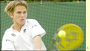 Michel Kratochvil plays a winning backhand