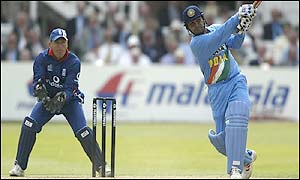 Sehwag hammers the ball through the leg-side