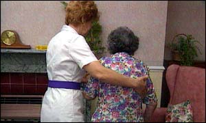 Old woman with helper