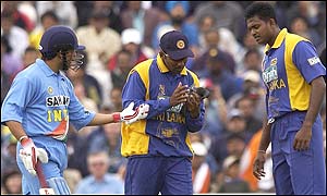 Tendulkar checks on the state of the pigeon his shot made contact with