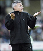 Jonathan Edwards shrugs his shoulders 