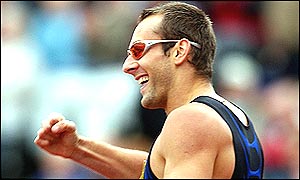 Chris Rawlinson wins the 300m hurdles