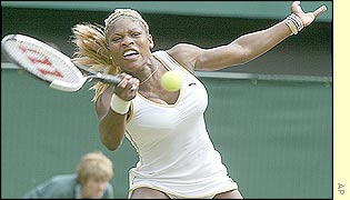 Serena Williams stretches to another game winning ball