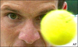 Tim Henman keeps his eye on the ball