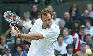 Britain's Greg Rusedski in action against Xavier Malisse from Belgium