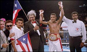 Puerto Rican Felix Trinidad celebrates victory over Maurice Blocker