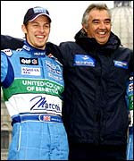 Jenson Button (left) poses with Flavio Briatore 