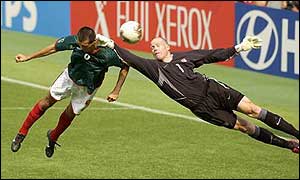 Friedel makes a save for the USA against Mexico