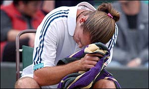 Xavier Malisse is clearly unhappy as he suffers from chest pains during the second set
