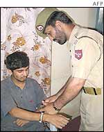 Kashmir police present suspected Lashkar-e-Toiba militant to Srinagar journalists 