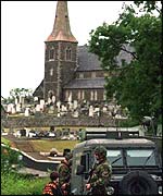 Soliders patrol near Drumcree church in Portadown