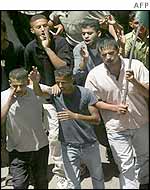 Supporters of Jibril Rajoub march through Ramallah