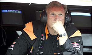 Tom Walkinshaw has financial matters on his mind as he watches his cars in qualifying at Silverstone