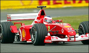 Ferrari's Rubens Barrichello moves into provisional pole position ahead of team-mate Michael Schumacher with just 14 minutes of qualifying left