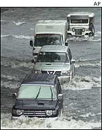 Cars in flood water in Manila