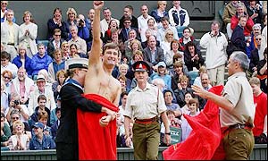 A streaker makes his point on Centre Court