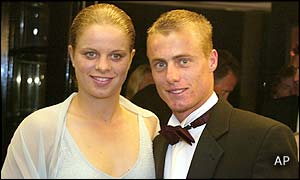 Men's champion Lleyton Hewitt and girlfriend Belgian tennis star Kim Clijsters 