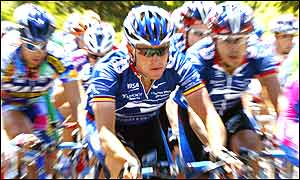 Lance Armstrong is flanked by his US Postal team-mates
