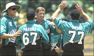 Geoff Allott takes a wicket in the ICC Knockout semi-final