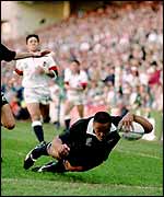 Jonah Lomu scores one of his four tries in the 1995 World Cup semi-final 