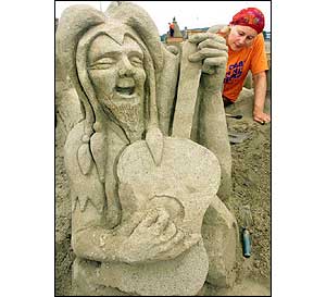 Sand sculpture of German literary figure Owlglass 