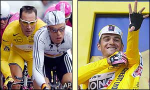 Igor Gonzalez de Galdeano pulls on the yellow jersey after taking the overall lead from Erik Zabel