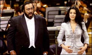 Luciano Pavarotti and guest