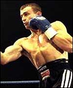 Richie Woodhall lands a punch against Glenn Catley