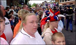 Sunshine: Onlookers enjoy the procession