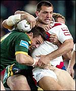 Jason Ryles tackles Great Britain's Lee Gilmour