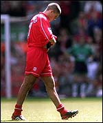 Liverpool's Steven Gerrard limps out the club's final game of the season against Ipswich after suffering a recurrence of a groin injury