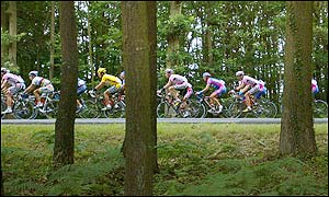 The riders enter a forest as they ride from Forges-les-Eaux to Alencon