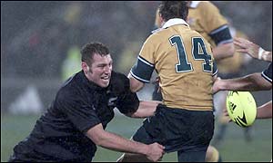 Reuben Thorne tackles Australia's Ben Tune