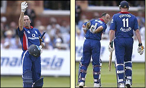 Nasser Hussain gestures to the press box after scoring his century