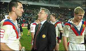 David Waite talks to his players after the 64-10 defeat