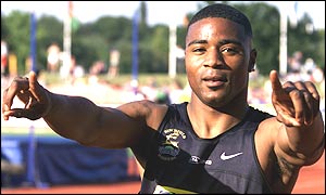 Mark Lewis-Francis celebrates winning the 100m