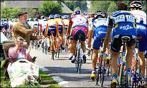 Spectators watch stage eight of the Tour de France