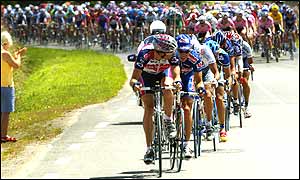 Stephane Auge leads the breakaway from the main peloton