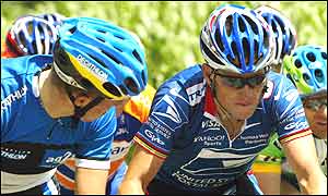 Lance Armstronjg rides in the main peloton
