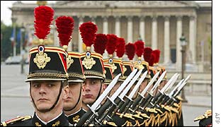 Soldiers from France's Republican Guard march down the Champs Elysees