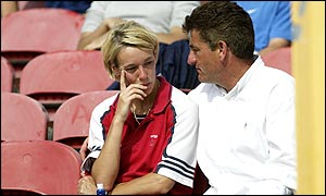 Pole-vaulter Janine Whitlock of Great Britain watches the men's pole vault 