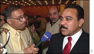 Major General Najib al-Salhi talks to reporters