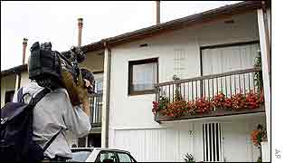 Cameraman outside gunman's home near Paris