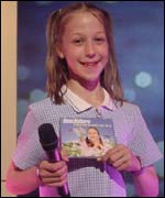 Demi Holborn holding CD