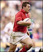 Iestyn Harris takes on the English defence